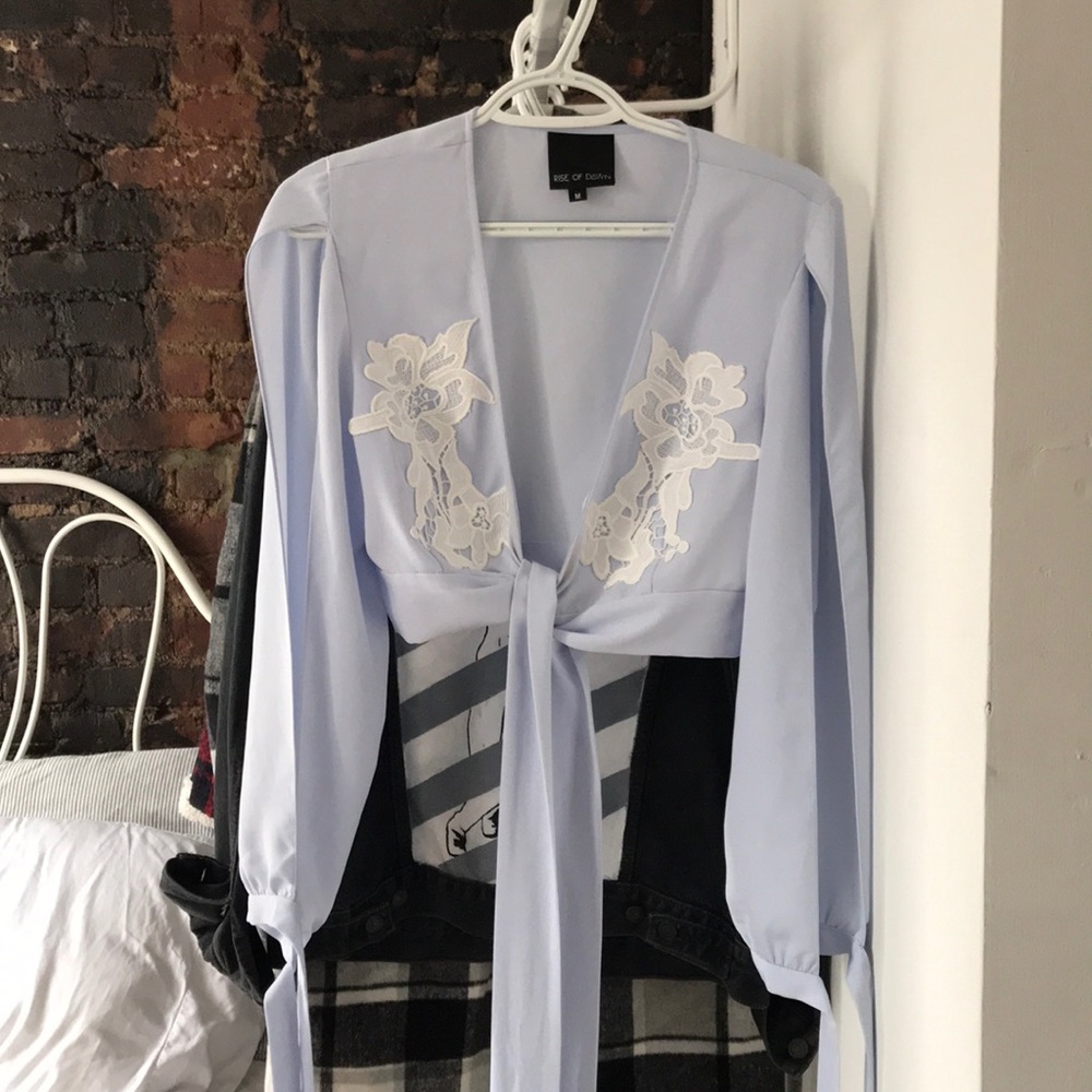 Wrap around top with open sleeves!